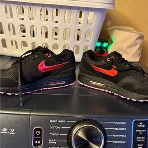 Nike Black Sneakers with Pink Accents